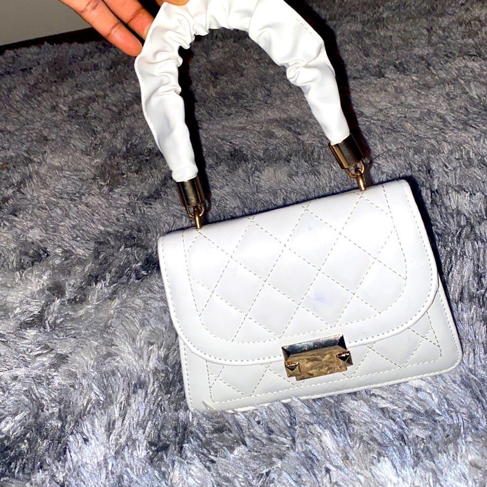 White mini purse.